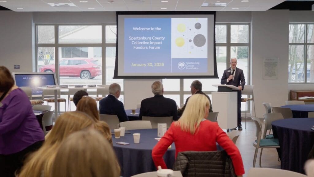 Troy Hanna presenting at the Funders Forum 2026